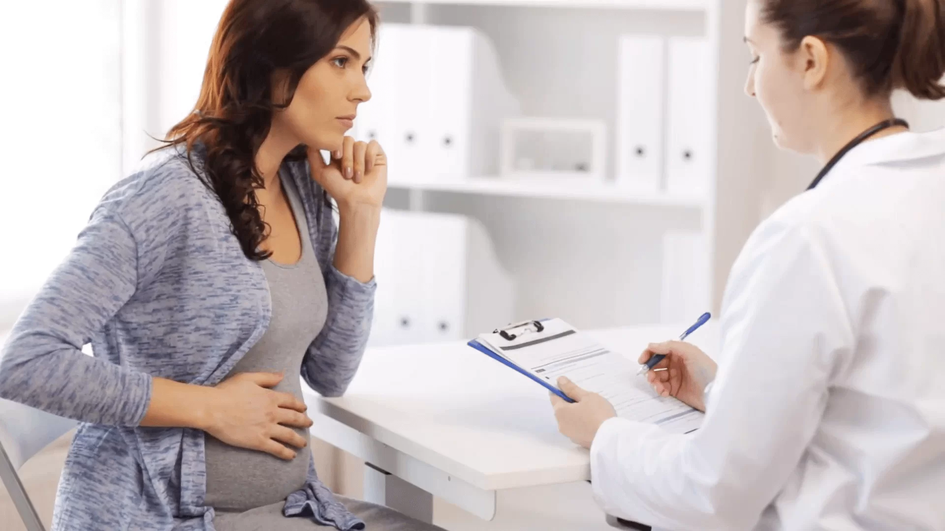 Woman consulting with Dr. Broad about endometriosis treatment options at Broad Medical Group in Newport Beach