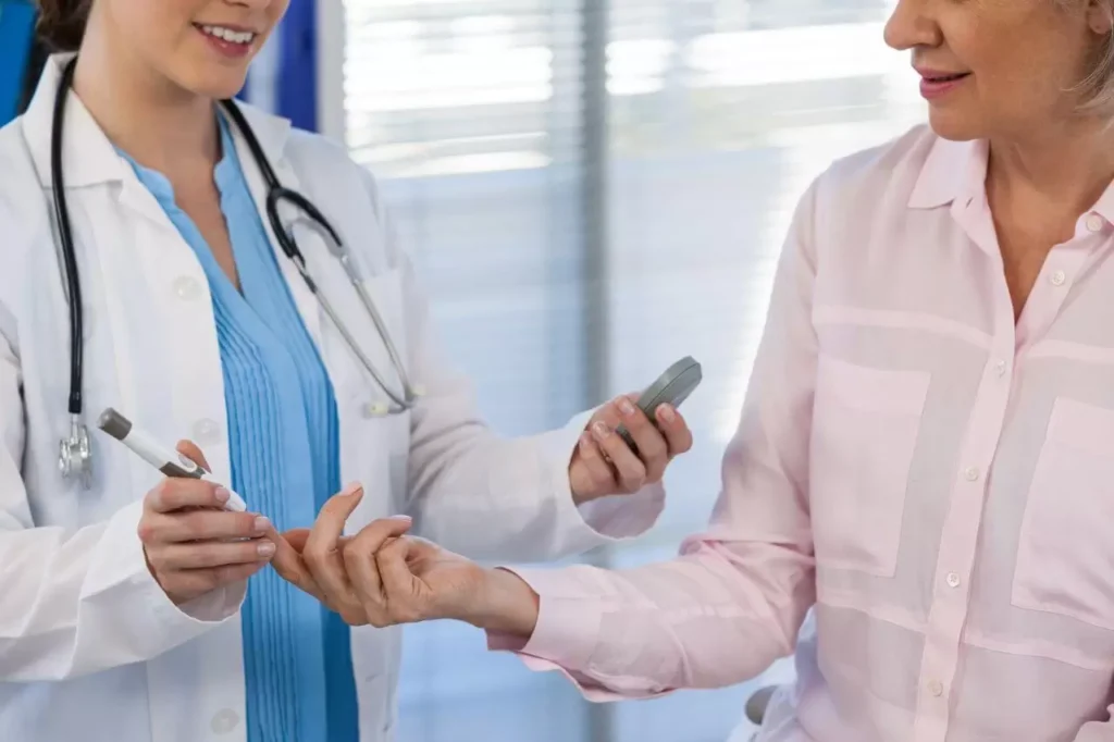 doctor-checking-glucose-level-in-diabetic-patient
