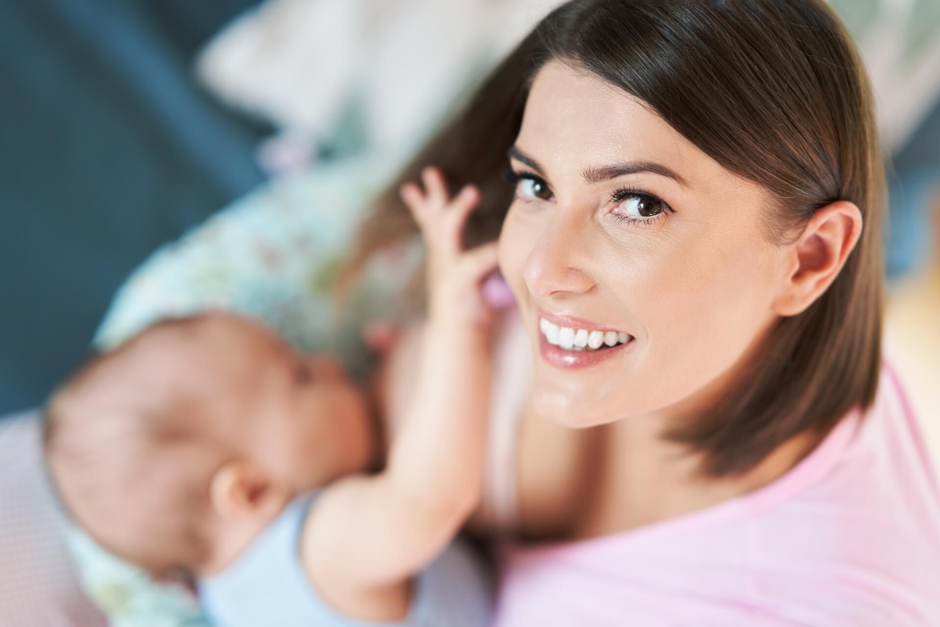 mother-breastfeeding-newborn-baby