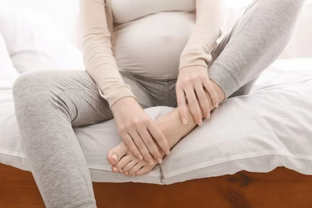 pregnant-woman-massaging-her-swollen-foot